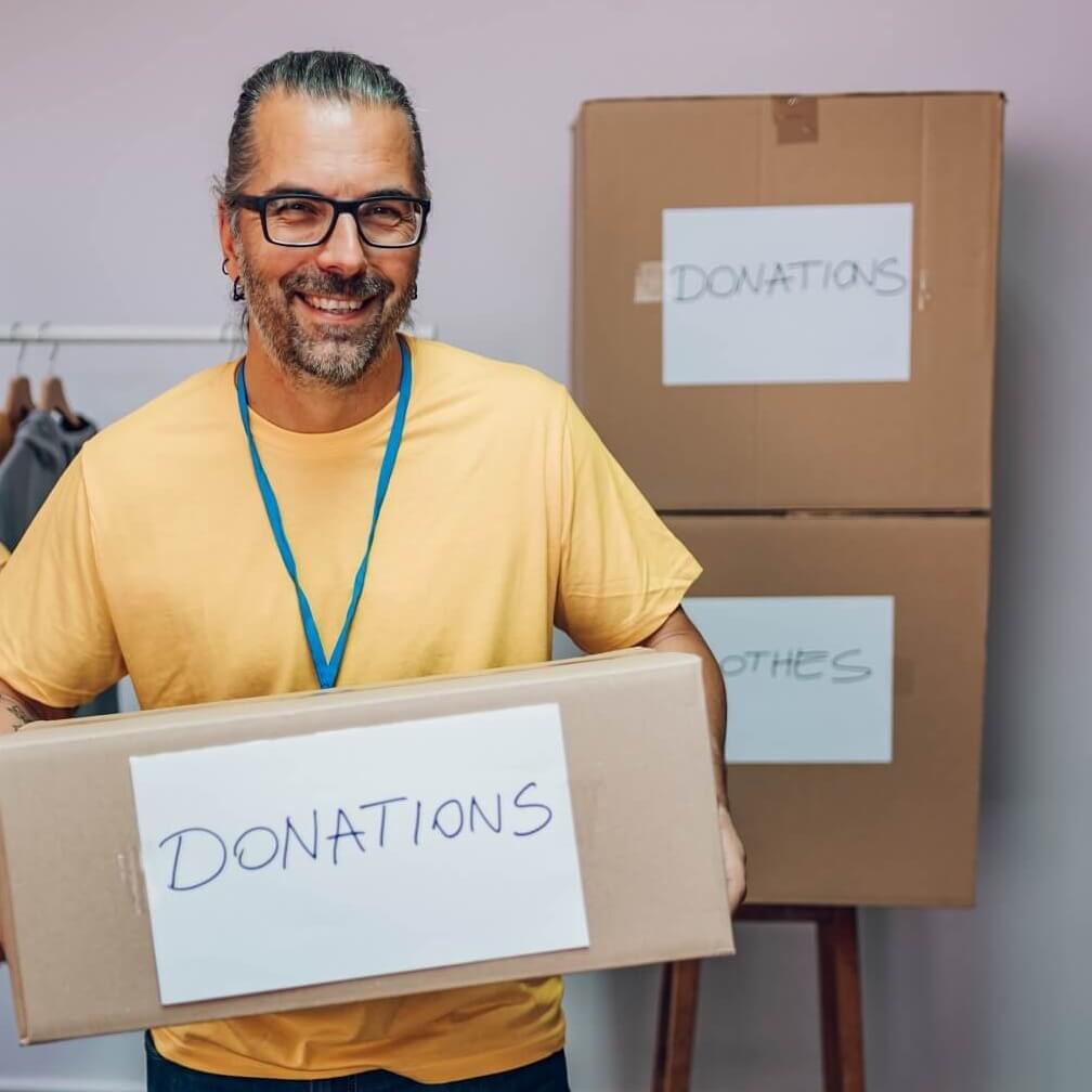 Macmillan coffee morning fundraising : 5 office ideas to maximise donations portrait of a middle aged man working in community 2022 10 27 04 18 24 utc cropped