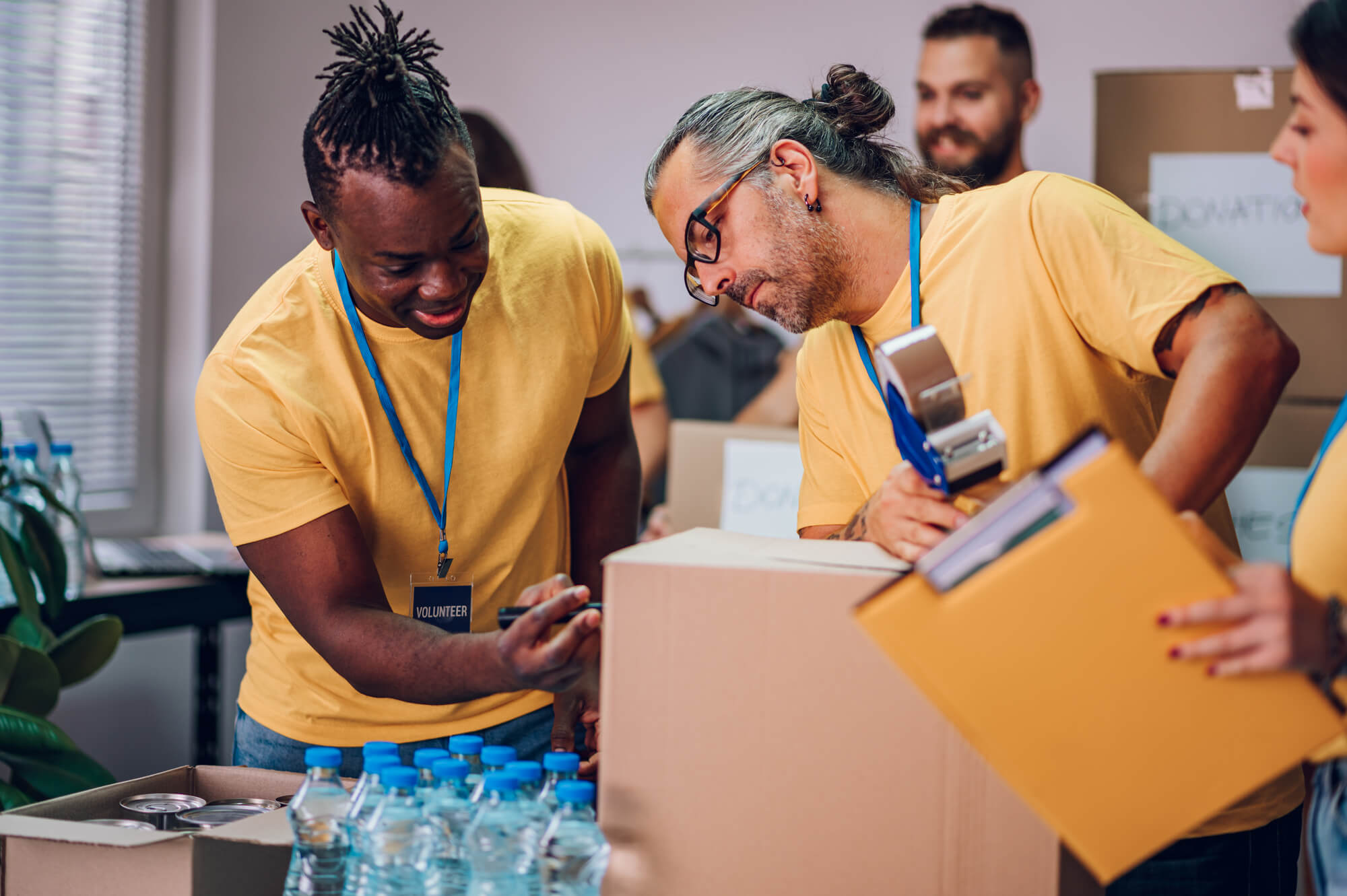 Group Of Multiracial Volunteers Working In Communi 2022 10 27 0