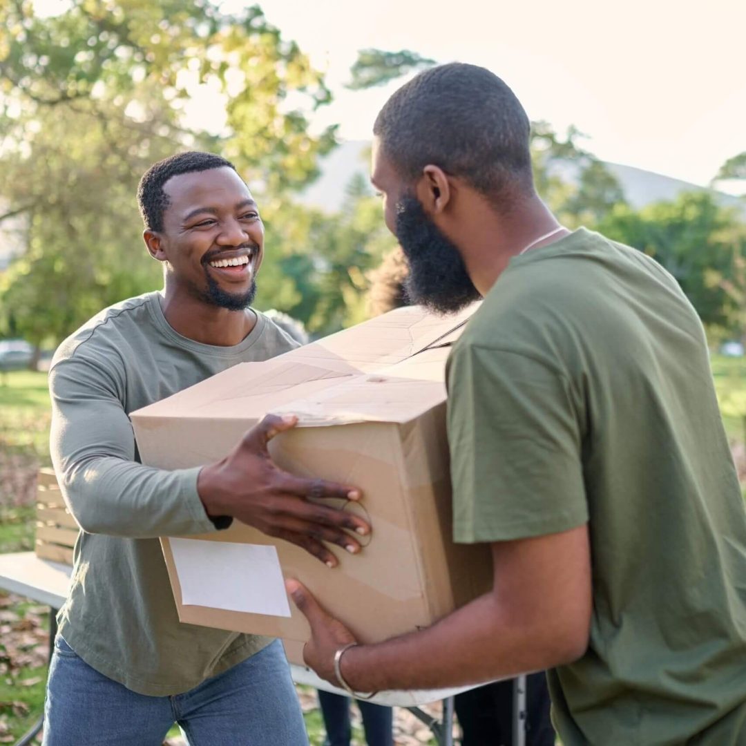 black man charity and holding box in park of dona 2023 02 07 21 57 49 utc cropped.jpg